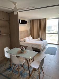 Hermoso y moderno Loft con Piscinas, vista al Mar y cerca de la Playa