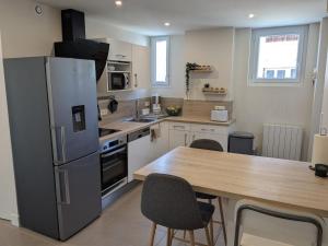 Appartements Appartement 2 chambres L-Oreade Sancy : photos des chambres