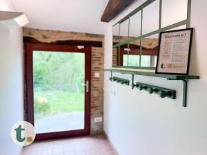 Maisons de vacances Tranquiloue - L-Atelier des Nympheas - PuyduFou : photos des chambres