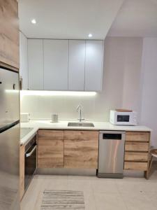 Bello apartamento con piscina a un paso del centro