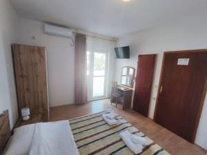 Tonino Apartments & Rooms