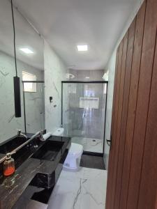 Casa e flat com piscina - Praia da Enseada