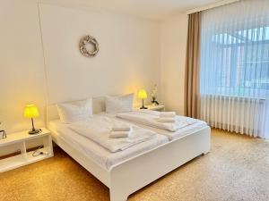 Ferienwohnung im Erdgeschoss mit eingezäunten Garten und Terrasse