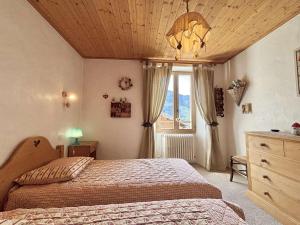 Appartements Appartement de 5 pieces a Praz-sur-Arly avec cheminee, mezzanine et parking - 8 pers - FR-1-603-7 : photos des chambres