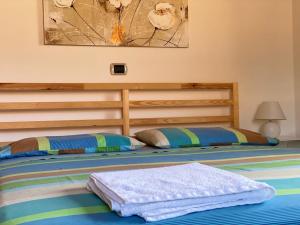 Attico Panoramico tra Verde e Mare con Giardino Deluxe