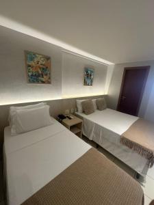 Flat em Ponta Nega com vista para o mar