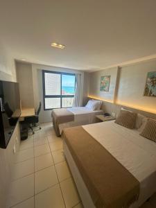 Flat em Ponta Nega com vista para o mar