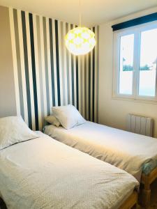 Appartements Soleil & Sable : photos des chambres