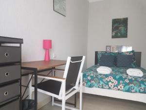 Appartements Au Bon Pasteur : photos des chambres