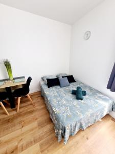 Appartements Studio 2 Cosy en centre-ville - Puy duFou : photos des chambres