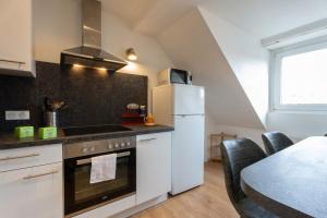 Appartements Ideal - Quiet garden - Free parking : photos des chambres
