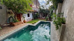 Depto privado con jardín y piscina en casa colonial - Centro de Asunción