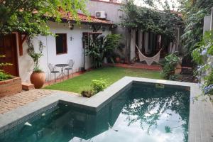 Depto privado con jardín y piscina en casa colonial - Centro de Asunción