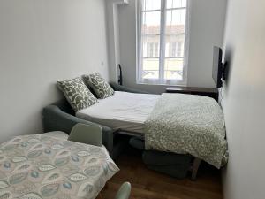 Appartements Chez Camille & Emma - Hyper Centre Climatise : photos des chambres