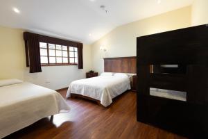 Hotel & Suites El Quijote
