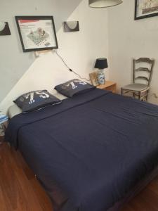 Sejours chez l'habitant petite maison 15 mn a pied du marche et vieux port : photos des chambres