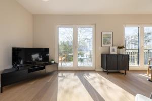 Ferienwohnung Strom Acht - modern frisch inkl Stellplatz, Balkon - 200m zum Alten Strom