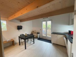 Appartements Logement avec terrasse : photos des chambres