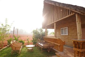 Maharsh Bamboo Stays near Devanahalli