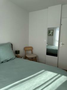 Appartements La Datcha - New T3 with balcony & parking near train station : photos des chambres
