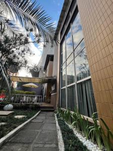 Praia da Costa Suítes