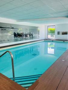 Appartements Residence 3 bord du lac logement T3 piscine spa : photos des chambres