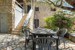 Appartements Cozy Apartment with Pool : photos des chambres