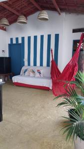 Suíte Maeri à beira mar Prado - Bahia