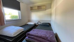 Maisons de vacances Mobilhome Eleganzia - Cc921 Les Charmettes 4 stars : photos des chambres