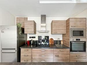 Appartements Charmant Duplex, Calme & Confort a 10 min de Paris : photos des chambres