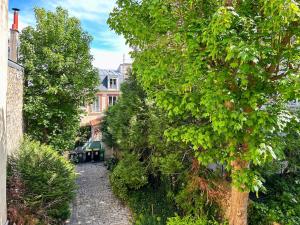 Appartements Charmant Duplex, Calme & Confort a 10 min de Paris : photos des chambres