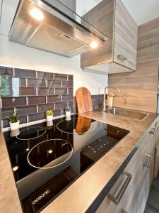 Appartements Charmant Duplex, Calme & Confort a 10 min de Paris : photos des chambres