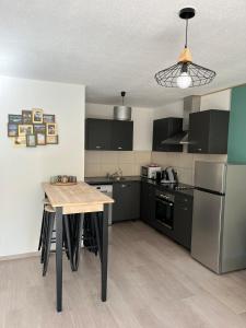 Appartements Le Lorain cozy avec terrasse : photos des chambres