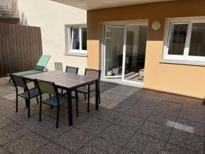 Appartements Le Lorain cozy avec terrasse : photos des chambres