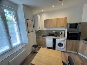 Appartements Bienvenue au Quai 29 : photos des chambres