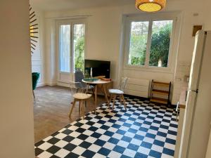 Charmant rez-de-jardin lumineux en plein centre ville de Grenoble