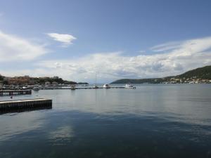 Apartments Vidas at sea with pier