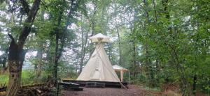Tentes de luxe TIPIsche trekkershut - Camping Le Soustran : photos des chambres