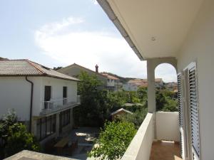 Apartments Vidas at sea with pier