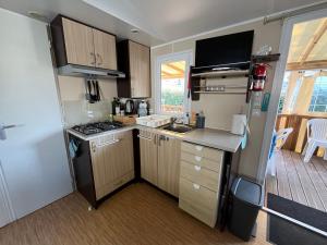 Campings Mobil-Home - Climatise, 6 couchages - Camping 1 Etoile : photos des chambres