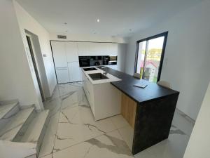 Villas Villa de standing avec piscine : photos des chambres