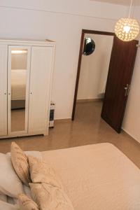 Appartement lumineux 2 chambres clim, Wi-Fi, parking proche corniche Tanger