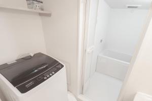 1 minute from Higashi-Shinjuku Station Large living room