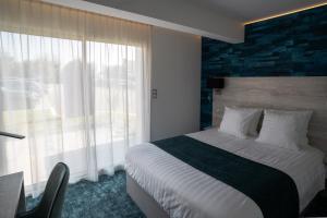 Hotels Hotel Le Manoir du Roselier : photos des chambres