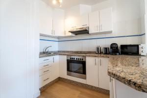 Castle Harbour Apartment with Heated Pool