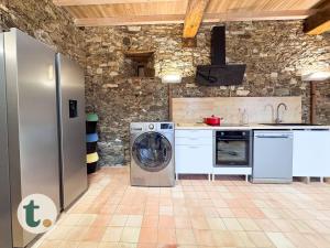 Maisons de vacances Tranquiloue - L-Atelier des Nympheas - PuyduFou : photos des chambres