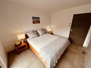 Villas Location villa entre lac et ocean avec son spa de nage : photos des chambres