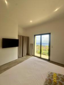 Villas Superbe villa vue mer et piscine : photos des chambres