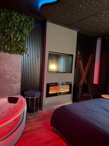 Appartements LoveroomXspa : photos des chambres