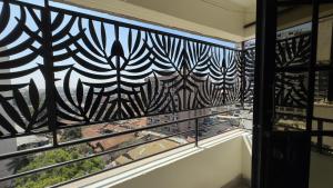 Cozy 1BR with Kitchen Balcony and Wi-Fi near CBD